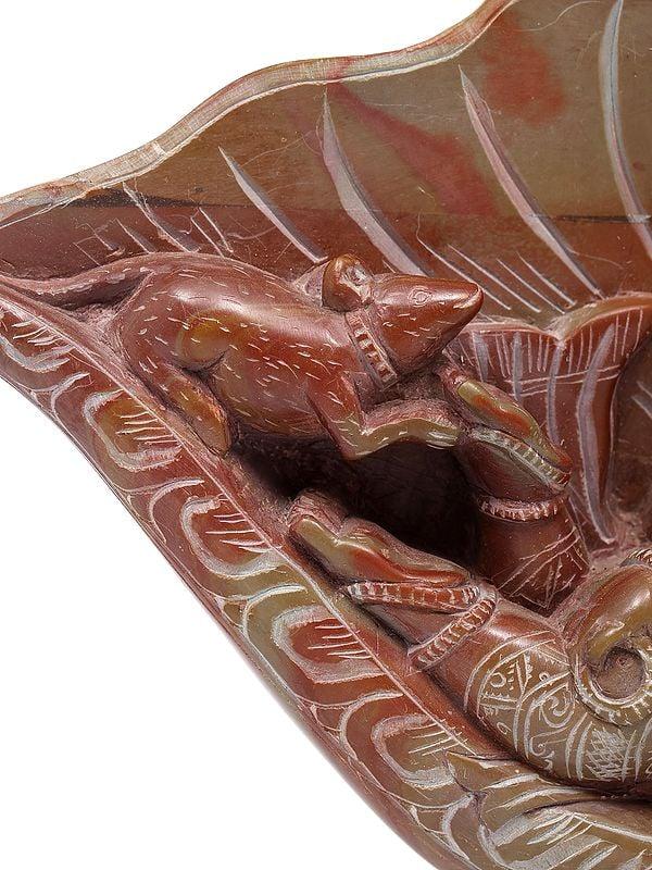 Exotic India 8" Relaxing Lord Ganesha Under The Conch | Relief Sculpture From Orissa 