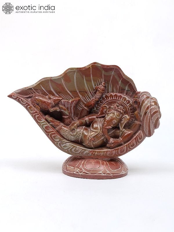 exotic india 8" Relaxing Lord Ganesha Under The Conch | Relief Sculpture from Orissa 