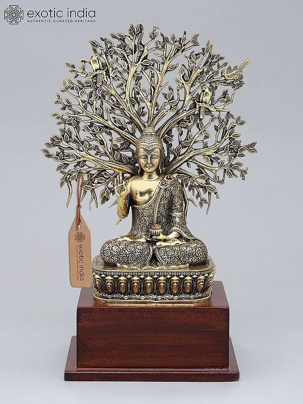 exotic india 8" Superfine Lord Buddha Seated Under The Bodhi Tree on Wood Base | Brass Statue 