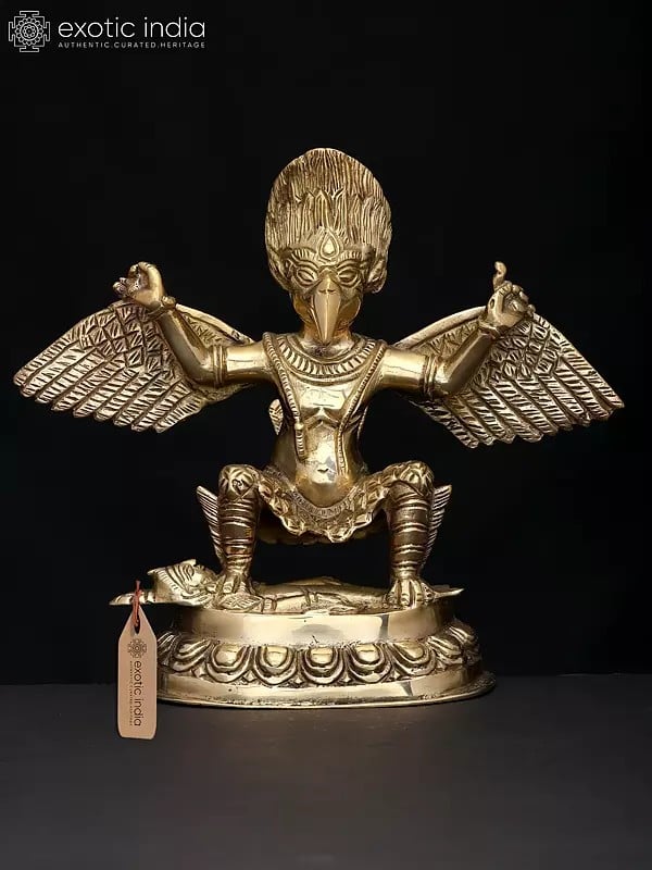 exotic india 9" Garuda Subduing The Demon | Brass Statue 