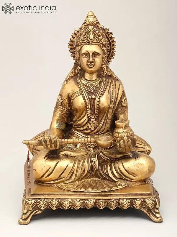 exotic india 9" Goddess Annapurna Seated on Pedestal | Brass Statue 