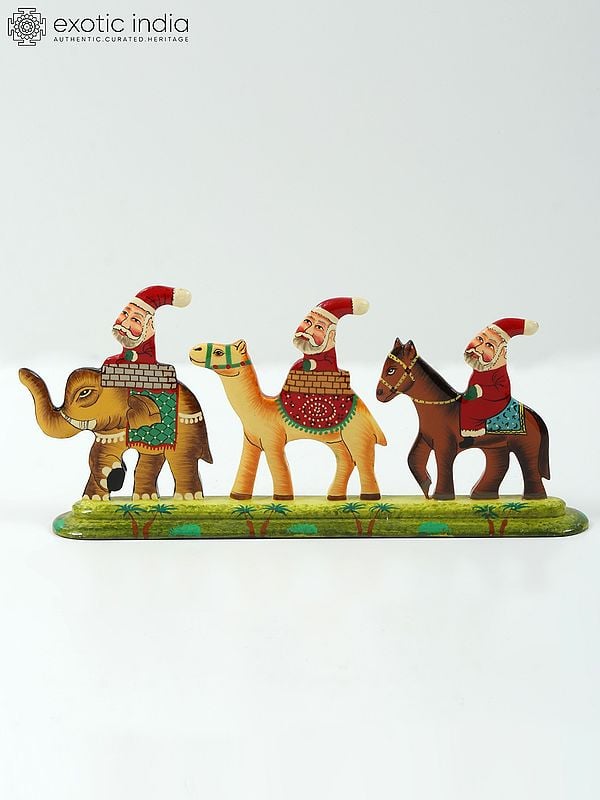 Exotic India 9" Hand Painted Wooden Santa Clauses Riding On Horse Camel And Elephant | Home Decor