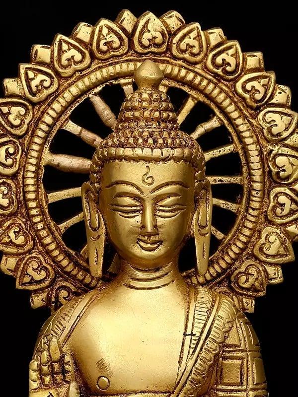 Exotic India 9" Lord Buddha Seated In Abhaya Mudra (Blessing Gesture) | Brass Idol 