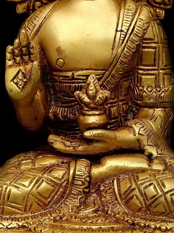 Exotic India 9" Lord Buddha Seated In Abhaya Mudra (Blessing Gesture) | Brass Idol 