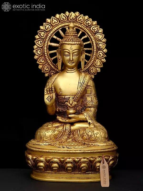 exotic india 9" Lord Buddha Seated in Abhaya Mudra (Blessing Gesture) | Brass Idol 