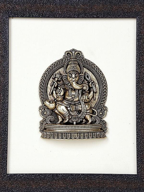 Exotic India 9" Superfine Lord Ganesha Seated On Mushak | Wood Framed Brass Sculpture | Wall Hanging Decor 