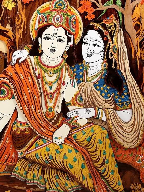 Exotic India 96" Large Superfine Radha Krishna Seated Under The Tree | Colorful 3D Panel In Rosewood With Inlay Work 