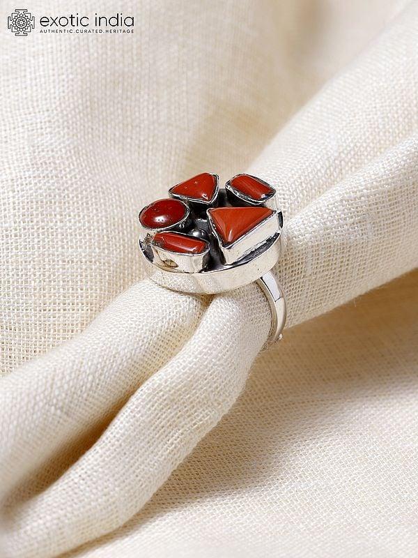 Exotic India Adjustable Circular Sterling Silver Ring With Coral 