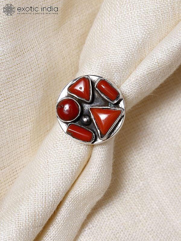 Exotic India Adjustable Circular Sterling Silver Ring With Coral 