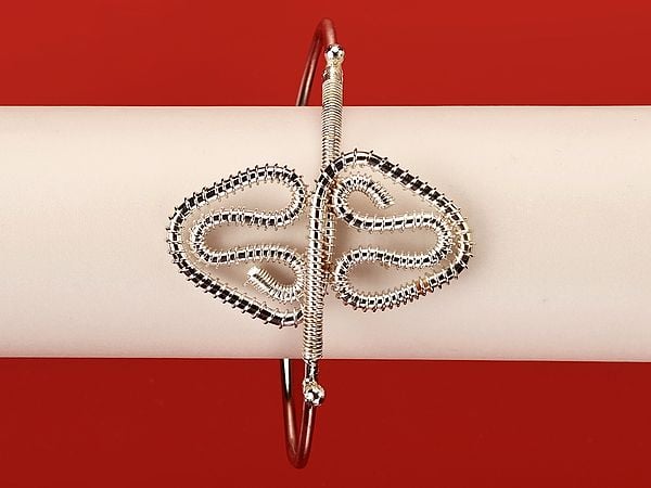 Exotic India Adjustable Curvaceous Triangle Design White Metal Bracelet | White Metal Jewelry
