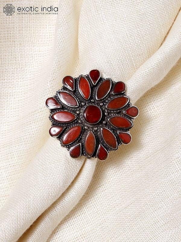 Exotic India Adjustable Floral Design Ring With Coral 