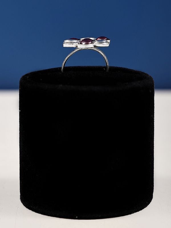 Exotic India Adjustable Floral Design Sterling Silver Ring With Garnet And Crystal Stone 