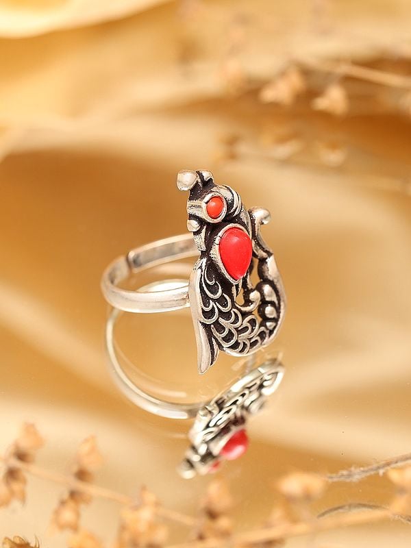 Exotic India Adjustable Sterling Silver Peacock Ring With Coral 