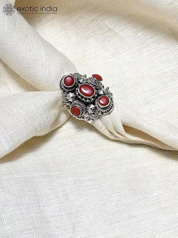 Exotic India Adjustable Sterling Silver Ring With Coral Gemstones 