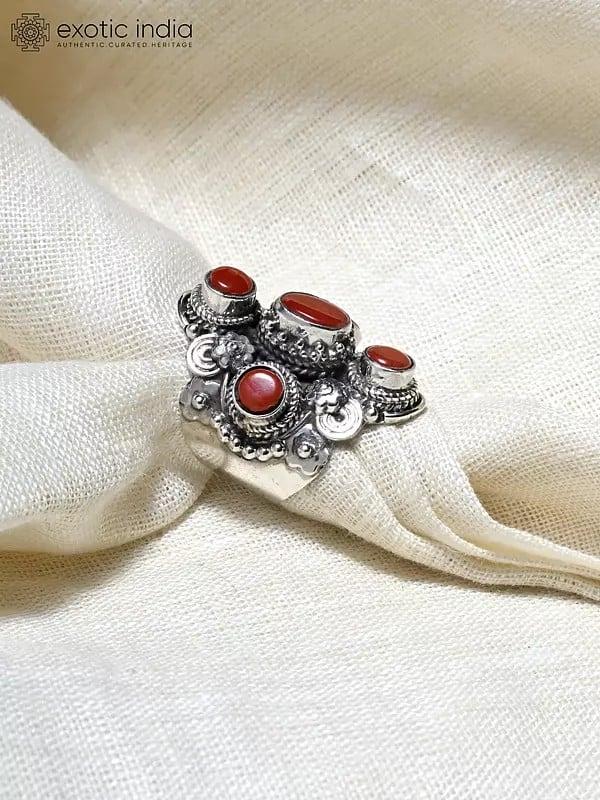 Exotic India Adjustable Sterling Silver Ring With Coral Gemstones 