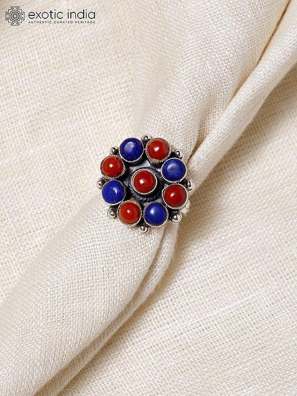 Exotic India Adjustable Sterling Silver Ring With Round Cut Coral And Lapis Lazuli 