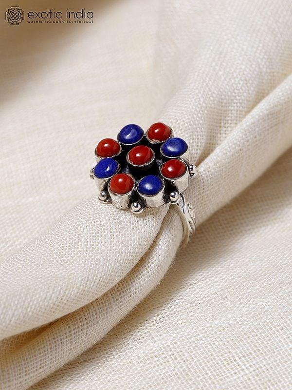 Exotic India Adjustable Sterling Silver Ring With Round Cut Coral And Lapis Lazuli 
