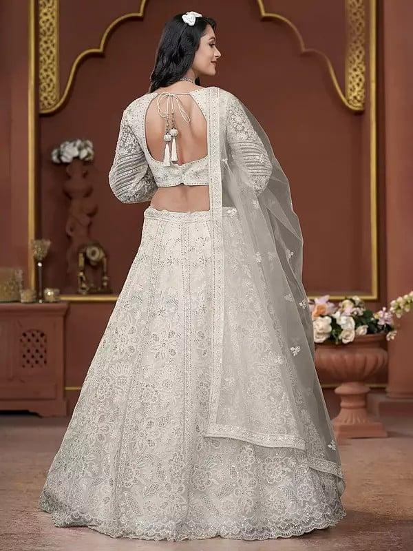 Exotic India All Over Zarkan Work Net Premium Net Floral Design Wedding Wear Lehenga Choli With Matching Dupatta 