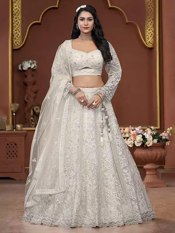 exotic india All Over Zarkan Work Net Premium Net Floral Design Wedding Wear Lehenga Choli With Matching Dupatta 