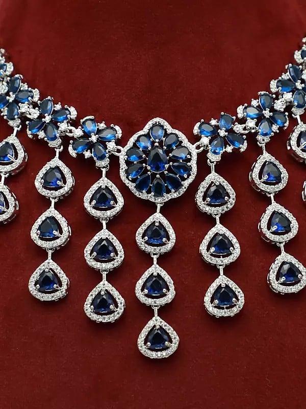 Exotic India American Diamond Elegant Stone Studded Necklace With Matching Earrings