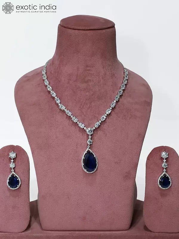 exotic india American Diamond Set Stylish Stone Studded Pendant With Earrings 