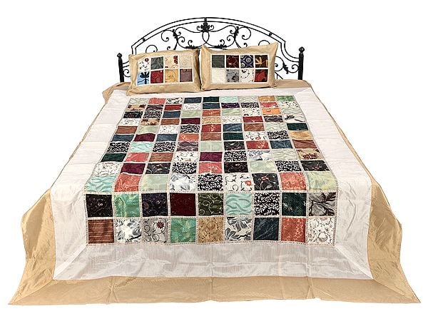 exotic india Art Silk Gold Print Multicolored Patch Work Bedcover in White and Gold Color from Jaipur 