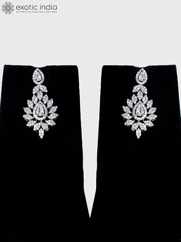 Exotic India Attractive Floral Design Stone Studded American Diamond Necklace Set With Earrings