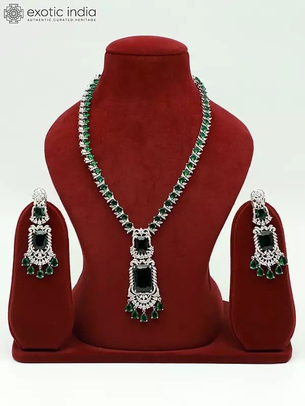 exotic india Attractive Floral Design Stone Studded American Diamond Necklace Set With Matching Earrings