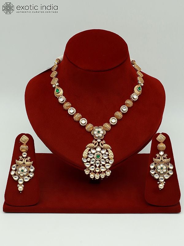exotic india Attractive Kundan Studded Necklace Set With Peacock Pendant And Earrings 