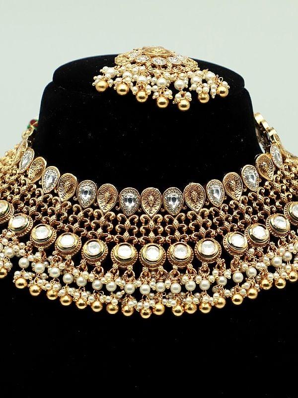 Exotic India Attractive Stone Studded And Beaded Choker Necklace With Matching Earrings And Mangtika