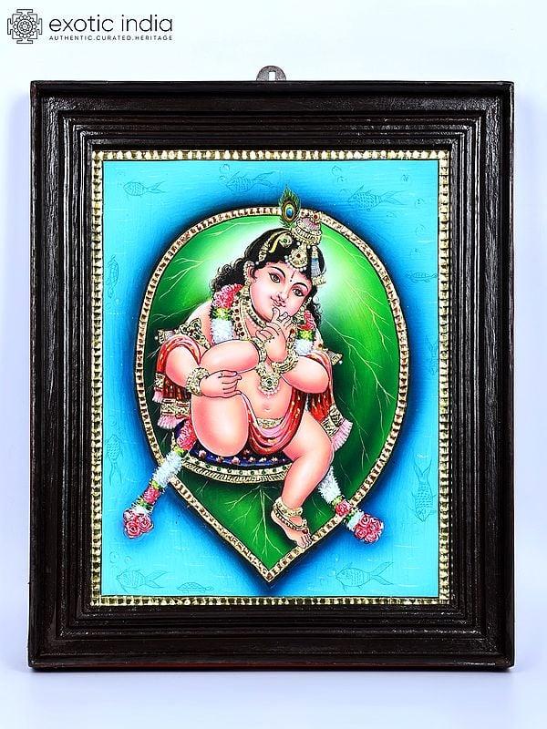 exotic india Bal Gopal on Pipal Leaf | 24 Karat Gold Work | Framed Tanjore Painting 