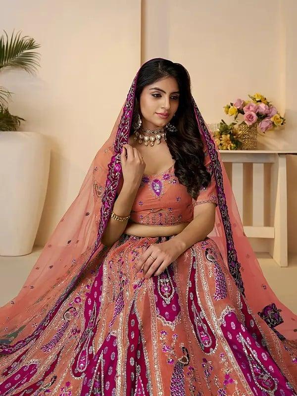 Exotic India Banarasi Silk Peacock Motifs Embroidery And Sequins Work Elegant Lehenga Choli With Soft Net Dupatta 
