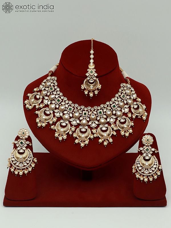 exotic india Beautiful Kundan Necklace Set With Hanging Pearl And Earrings