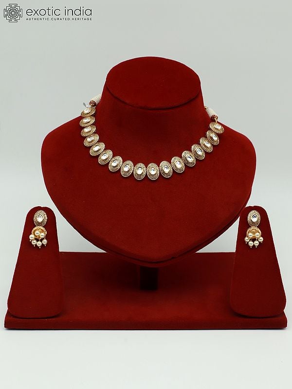 exotic india Beautiful Light Necklace Set With Kundan Studded And Earrings