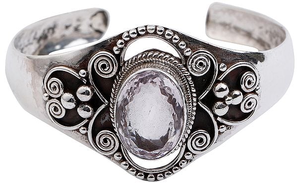 Exotic India Beautifully Crafted Silver Bracelet Cuff Bracelet With Oval Cut Amethyst From Nepal (Adjustable Size) 