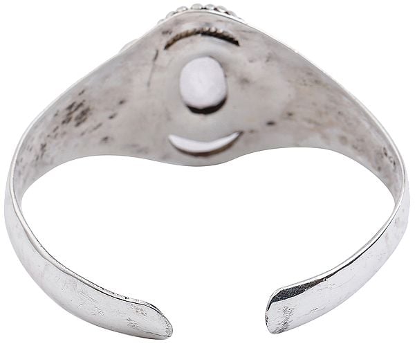 Exotic India Beautifully Crafted Silver Bracelet Cuff Bracelet With Oval Cut Amethyst From Nepal (Adjustable Size) 