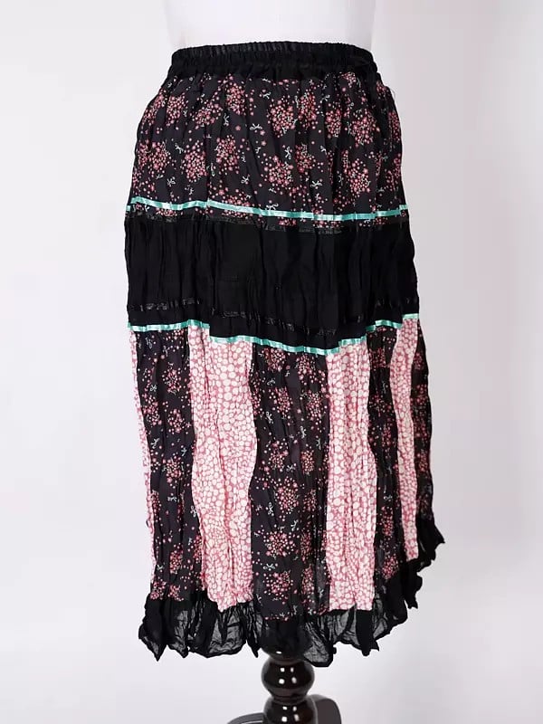 Exotic India Black-Olive Printed Elastic Long Skirt With Ruffle Border 