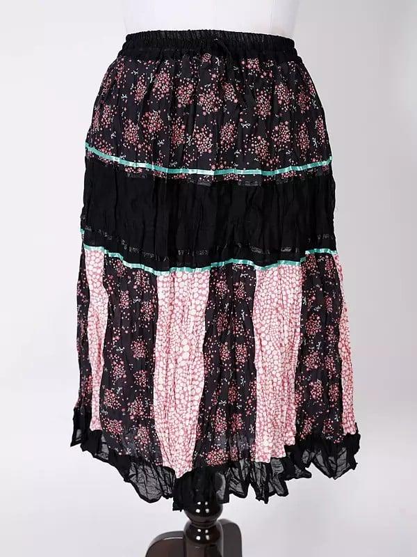 exotic india Black-Olive Printed Elastic Long Skirt with Ruffle Border 