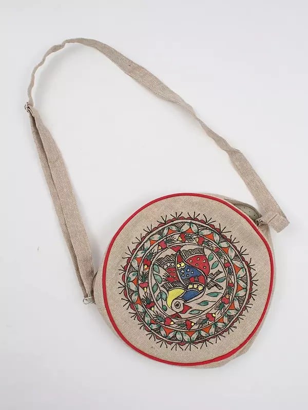 exotic india Bleached-Sand Round Sling Jute Bag with Madhubani Hand-Painted Peacock 