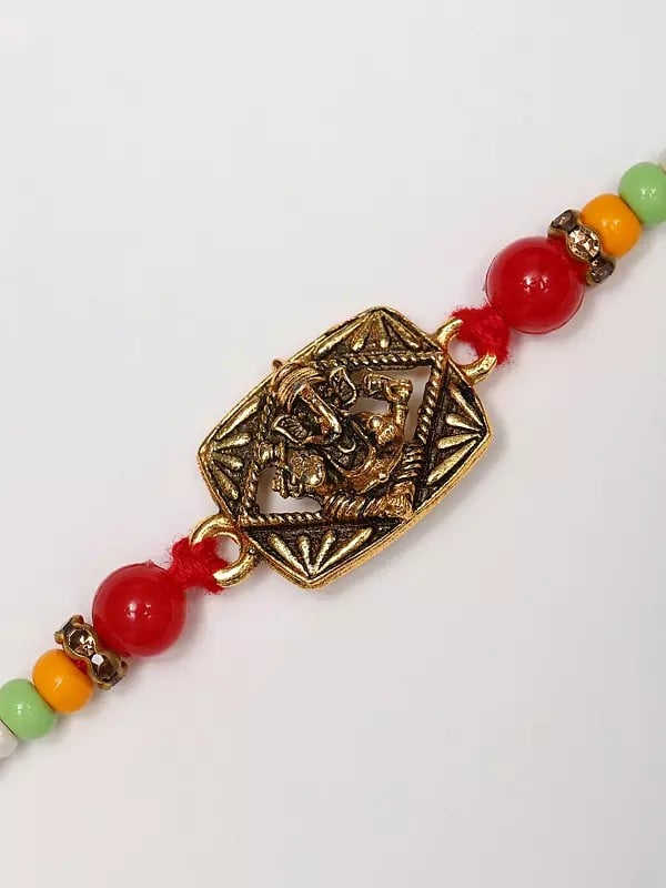 Exotic India Blessing Lord Ganesha Rakhi With Beads 