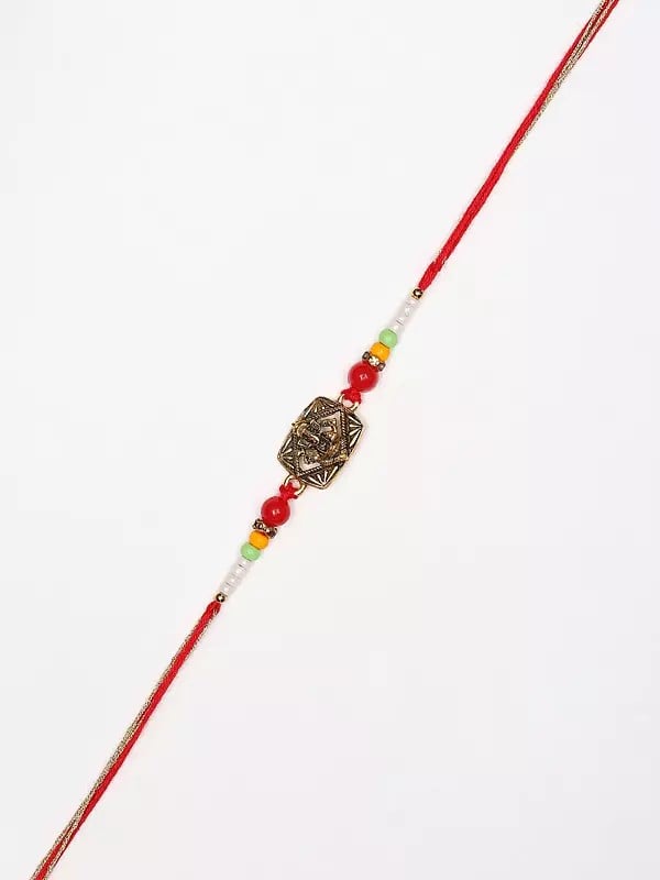 Exotic India Blessing Lord Ganesha Rakhi With Beads 