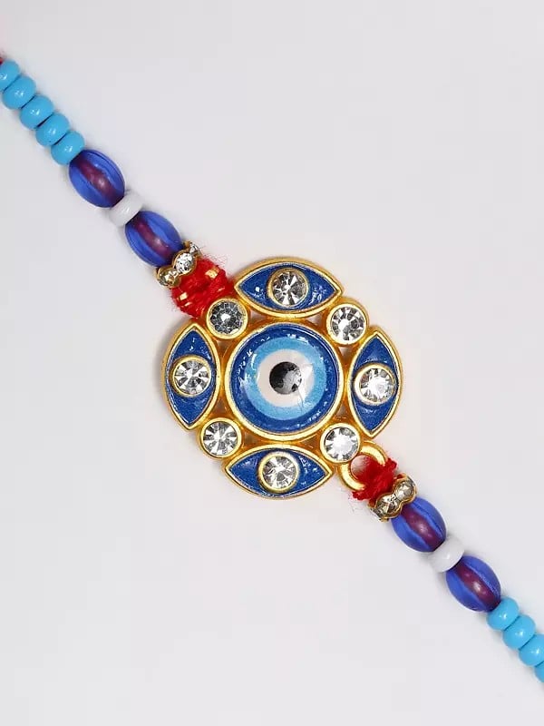 Exotic India Blue Evil Eye Rakhi With Studded Stone For Protection From Negative Energy 