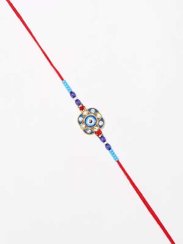 Exotic India Blue Evil Eye Rakhi With Studded Stone For Protection From Negative Energy 