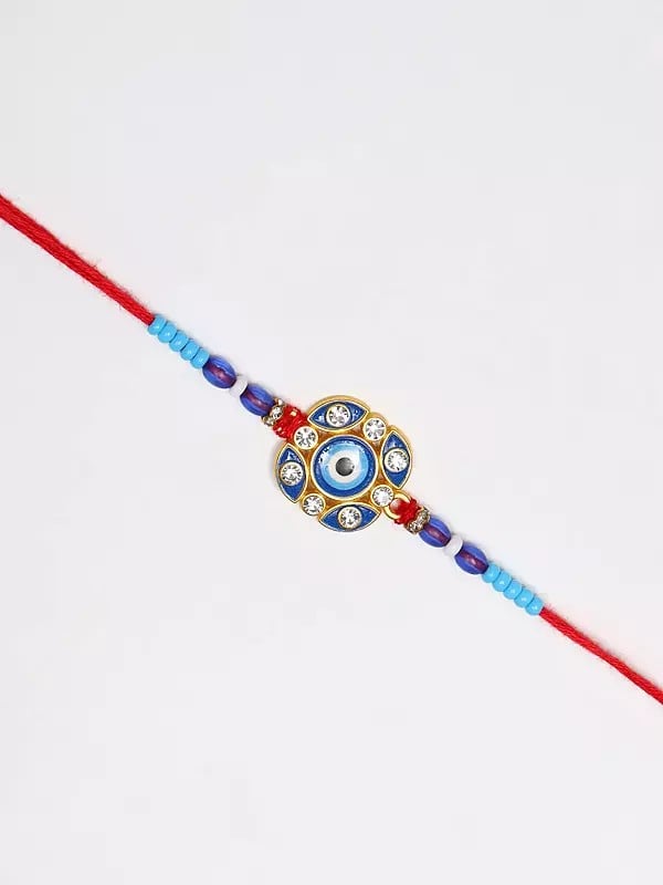 exotic india Blue Evil Eye Rakhi with Studded Stone for Protection from Negative Energy 
