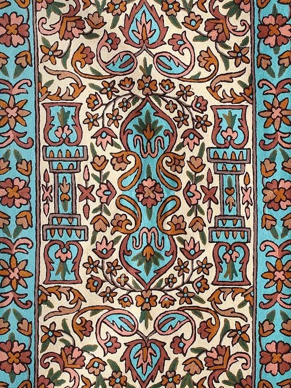 Exotic India Blue Grotto And Alabaster Gleam Cashmere Wool Chain Stitched Embroidered Carpet With Tassels And Traditional Motifs From Kashmir 