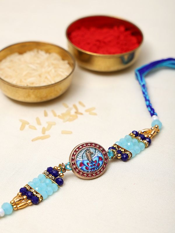 Exotic India Blue Stone Beaded Meenakari Peacock Rakhi 