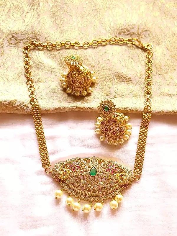 exotic india Brass Attractive Necklace Set in Green Stone and White Pearl with Earrings 