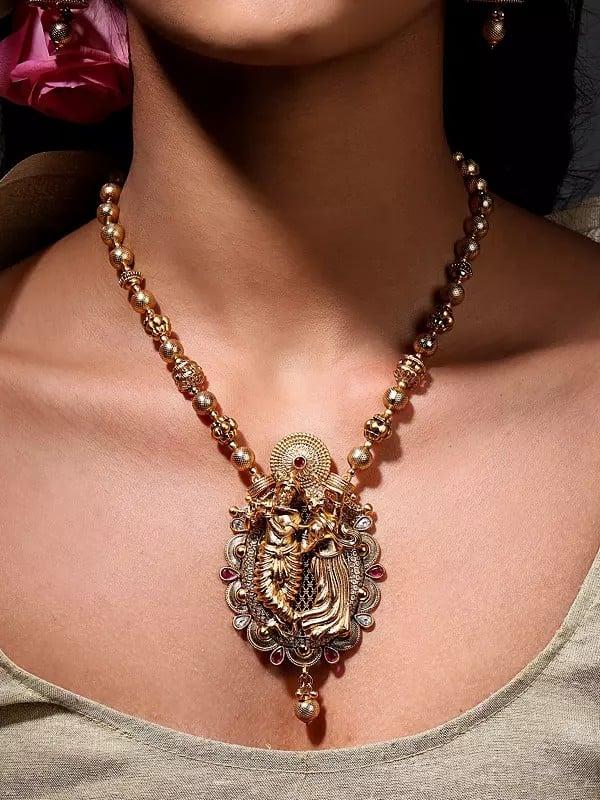 Exotic India Brass Dancing Radha Krishna Necklace Set With Earrings 