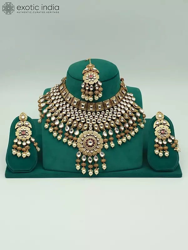 exotic india Brass Heavy Necklace Set With Kundan Mangtika And Beads Earrings 