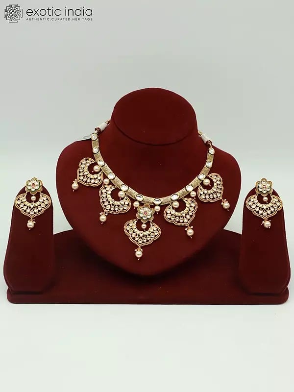exotic india Brass Necklace Set With Kundan Studded Earrings And Hanging Beads 
